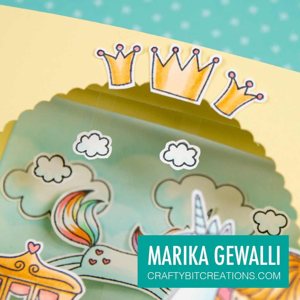 Close up of the upper part of the shadow box, showing three crowns.