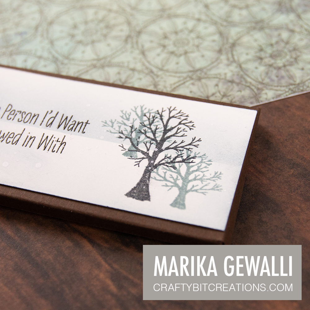 Close up of showing the depth created by stamping trees in two different colors on the Hersey Chocolate Bar Box