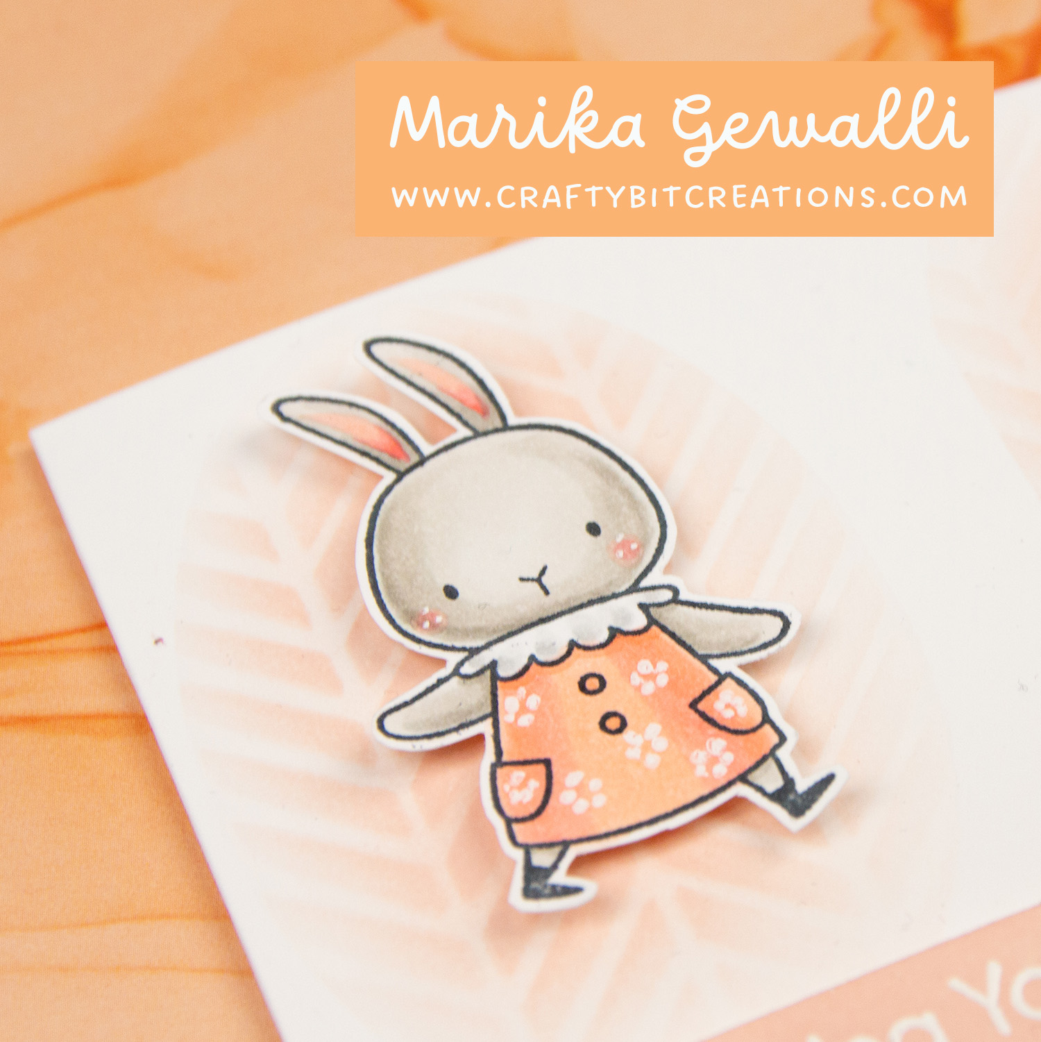Stamped bunny in dress with flower pattern on greeting card