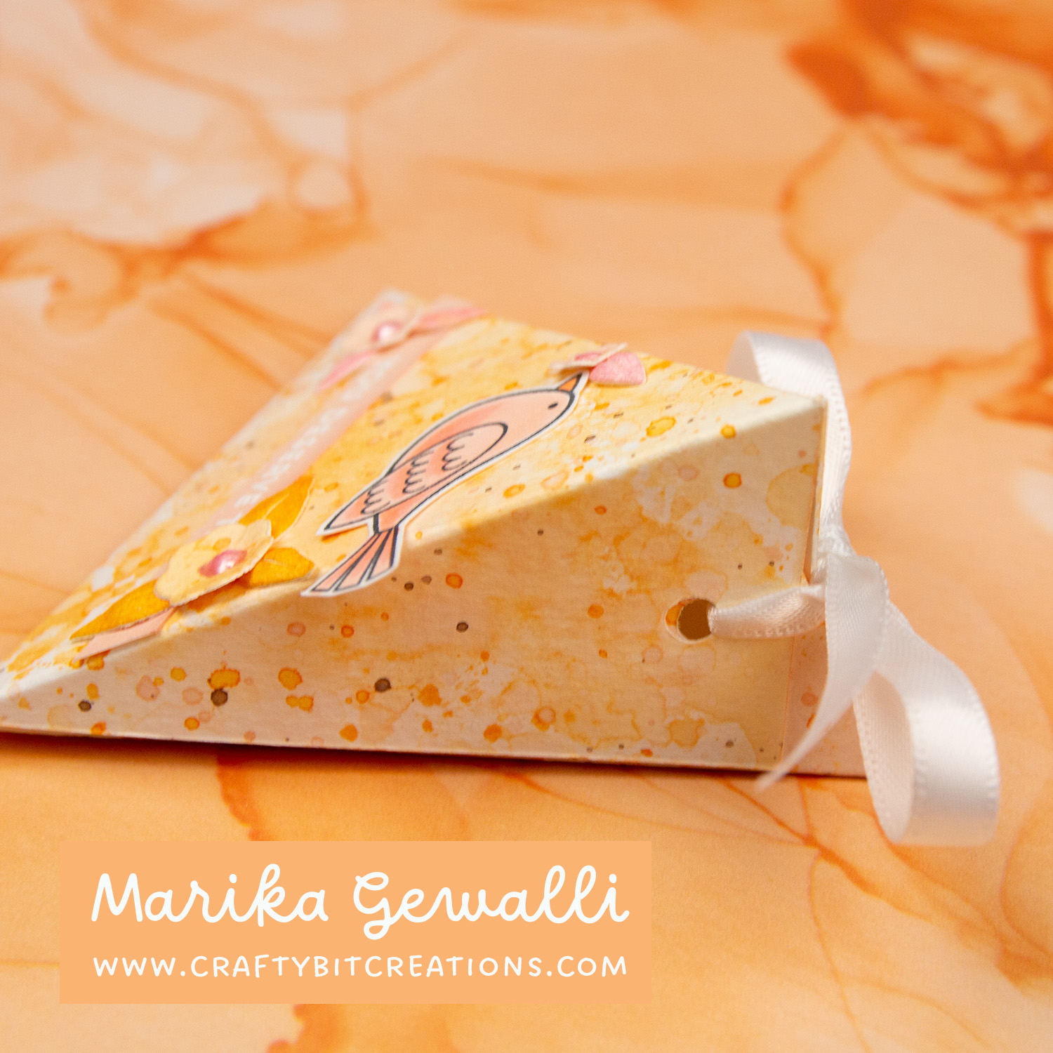 Mini triangle made from watercolor cardstock with an ink smootch technique