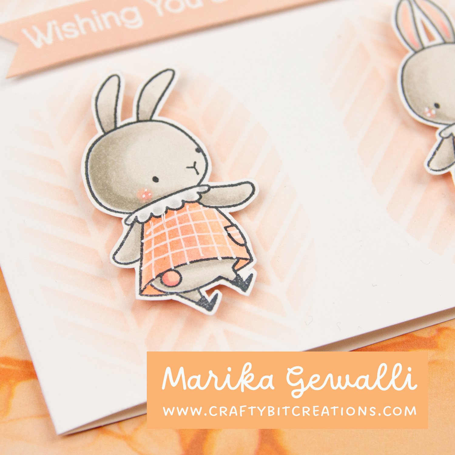 Stamped bunny in dress with grid pattern on greeting card