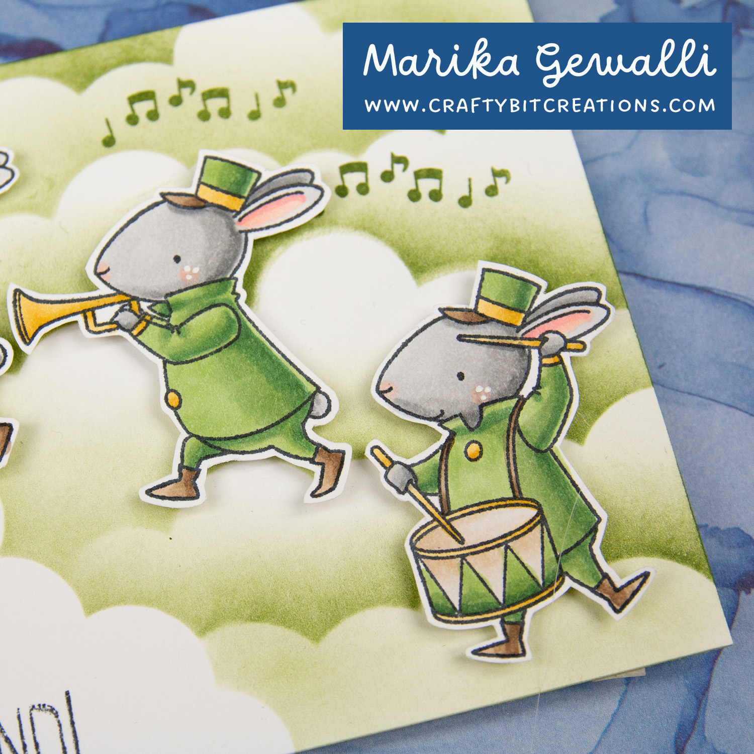 Closeup on copic colored stamp of a bunny in a band clothes and a drum