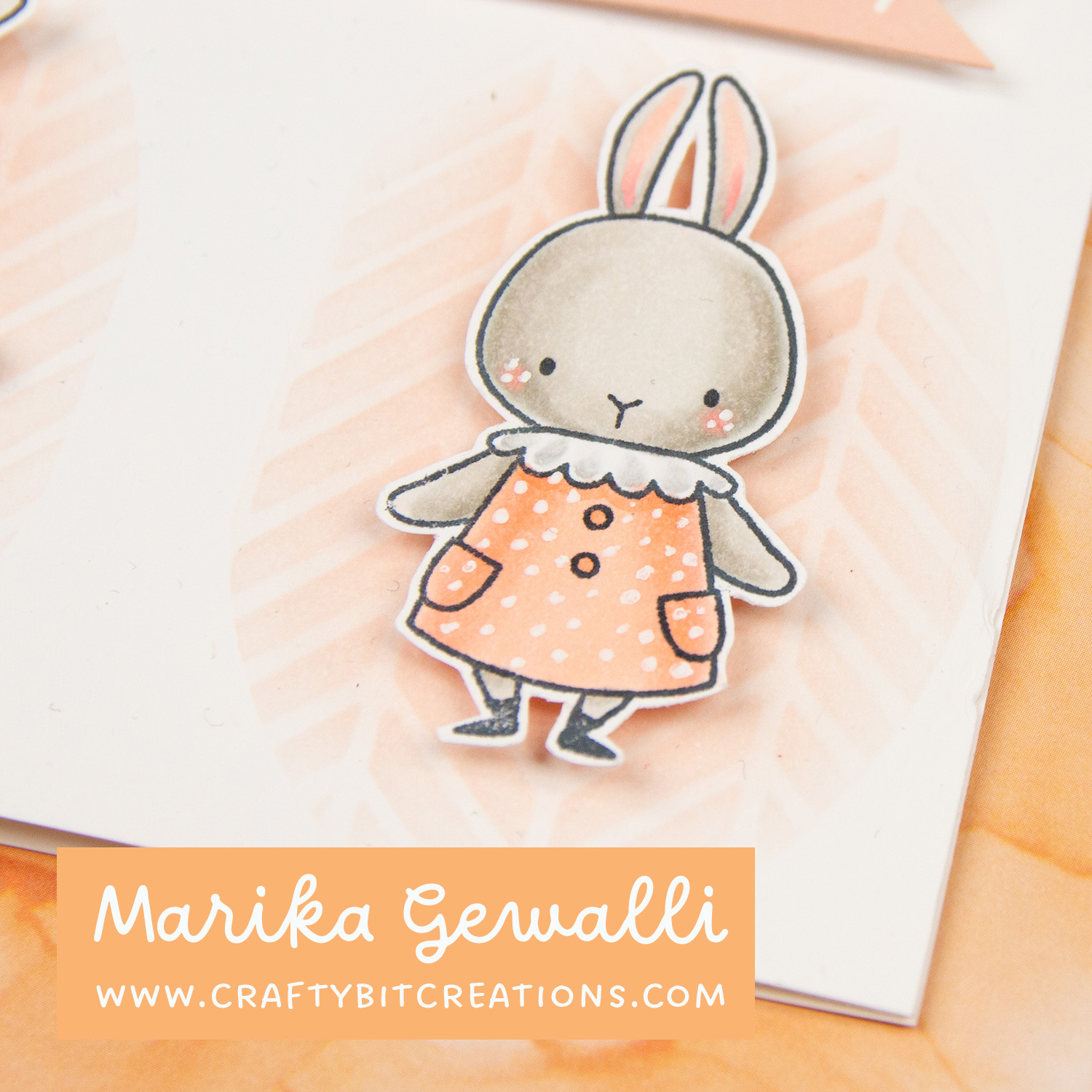 Stamped bunny in dress with dot pattern on greeting card