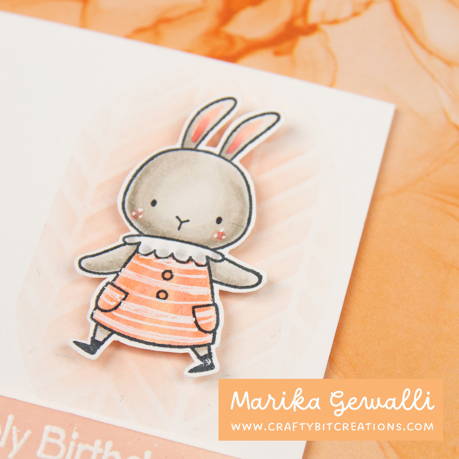 Stamped bunny in dress with horizontal stripes pattern on greeting card