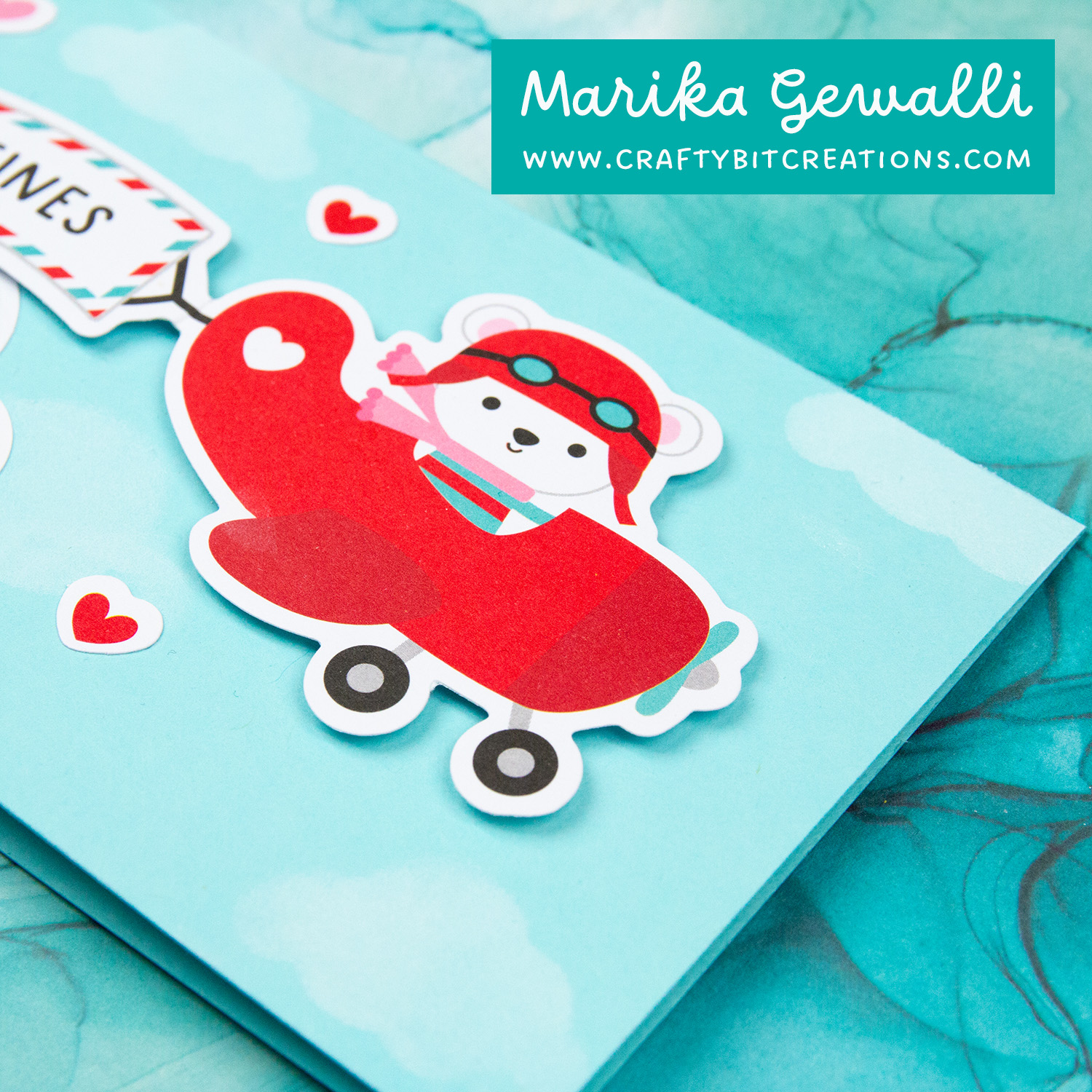 Close up slimline card with diecuts from doodlebug designs showing a plane with a flag following, clouds and hearts